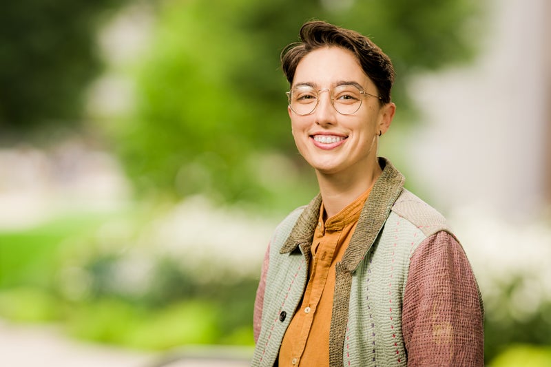 Mo Smith wearing a multicolored shirt